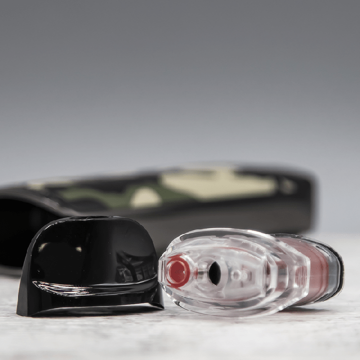 Cartouche Luxe Q vue de dessous avec son bouchon en silicone rouge