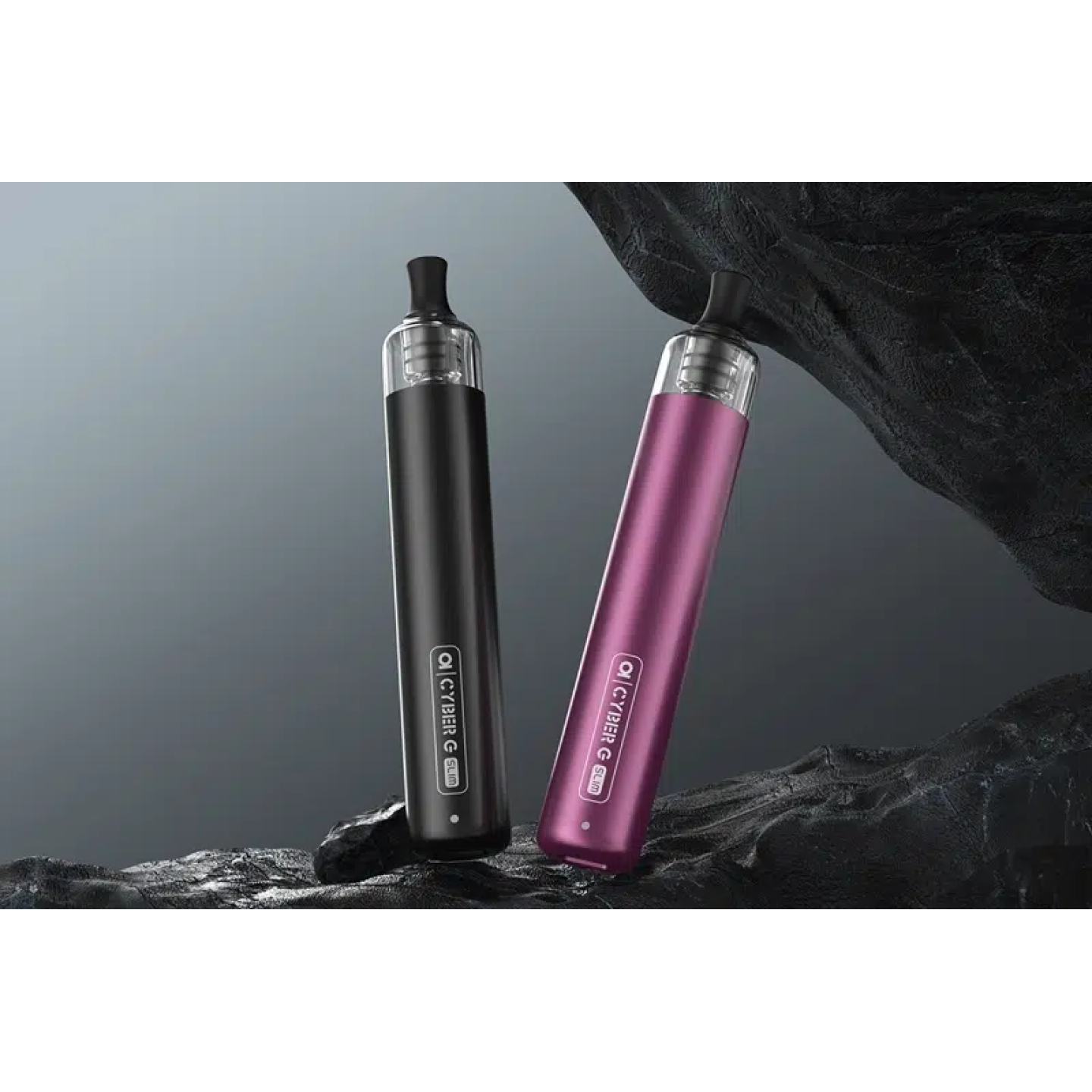 Cyber G Slim noir et violet posés sur une roche, cartouches TG Pod montées